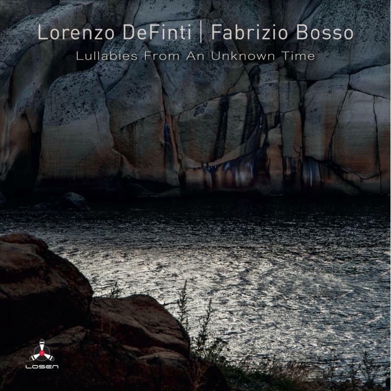 CD cover: rocky landscape with water, featuring artist names and title.