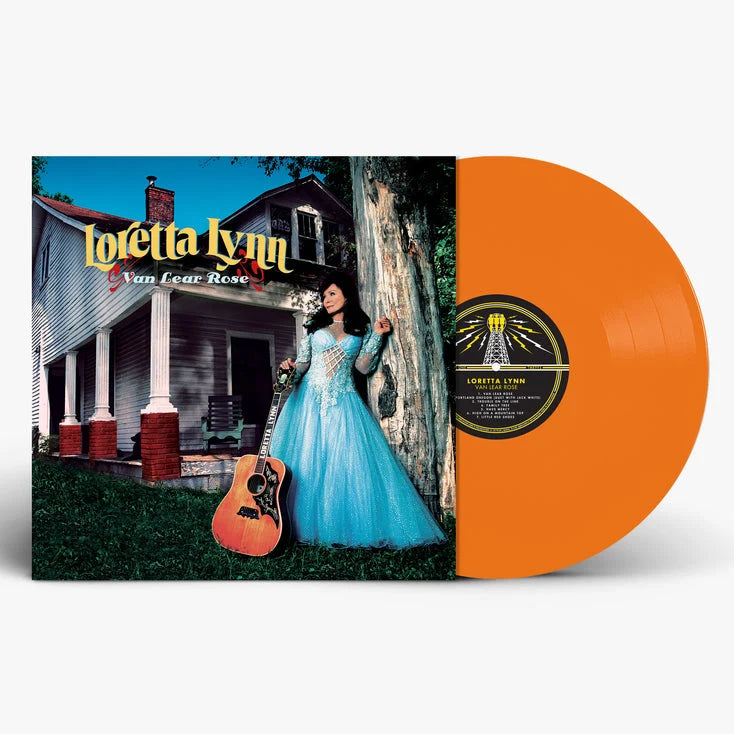 Loretta Lynn’s “Van Lear Rose” album cover and bright orange vinyl record.