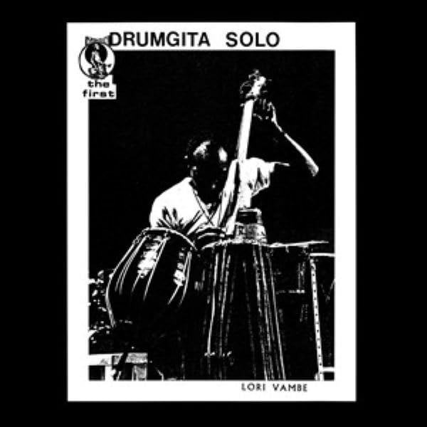 Black and white album cover featuring a drummer playing multiple drums.