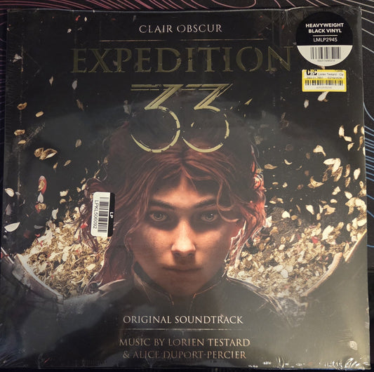 Vinyl record cover: woman’s face with dark, swirling smoke and text “Expedition 33”.