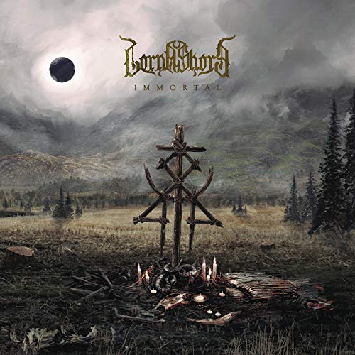 Lorna Shore "Immortal" album cover: desolate landscape with a ritualistic scene.