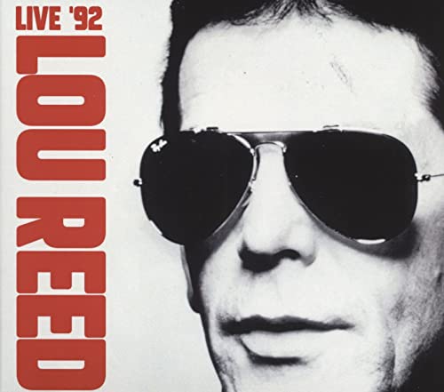 Lou Reed album cover, close-up of a man wearing sunglasses.