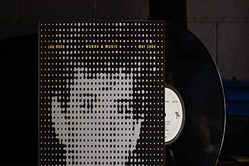 Lou Reed album cover with halftone portrait and vinyl record beside it.