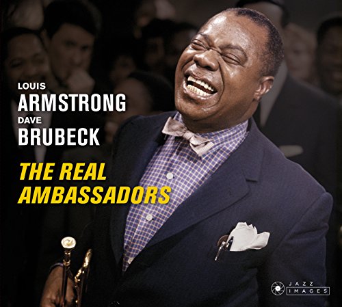 Louis Armstrong smiling broadly while holding a trumpet on The Real Ambassadors album cover.