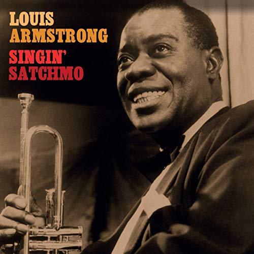 Louis Armstrong smiling, holding a trumpet, album cover for "Singin' Satchmo".