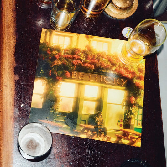 CD case with pub facade image, surrounded by drinking glasses.