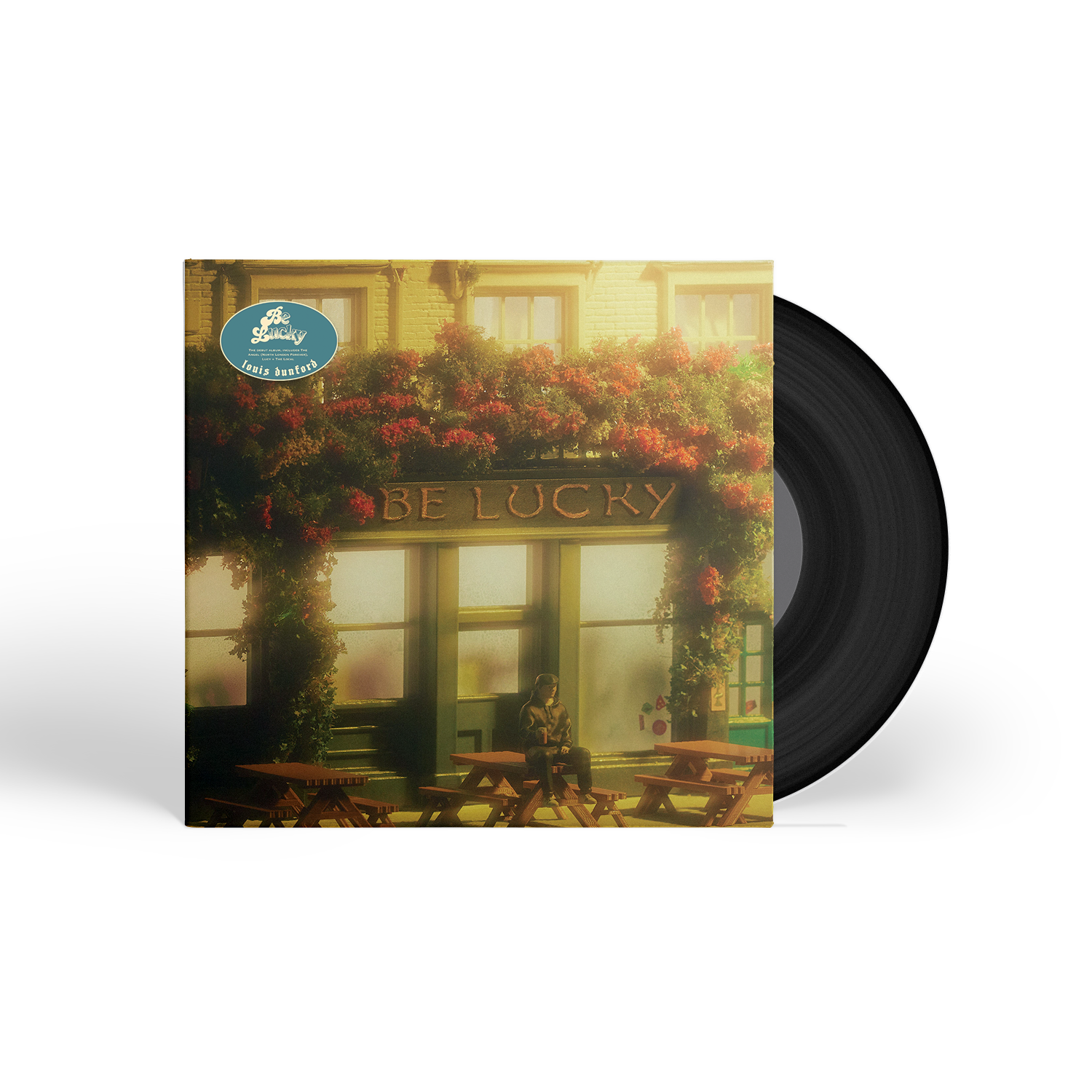 Vinyl record cover showing a person sitting at a pub table with floral decor.