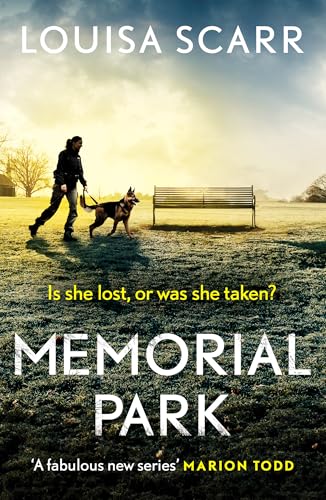 Book cover: police officer with dog in a misty park setting.
