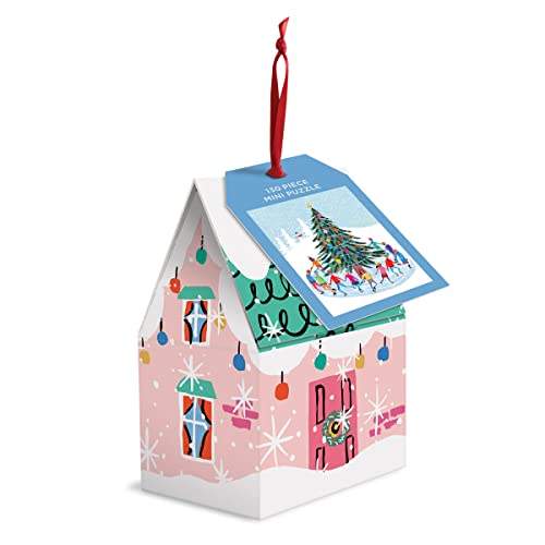 House-shaped puzzle ornament with skaters around a Christmas tree.