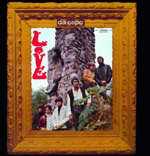 "Vinyl record cover featuring a group of men in a gold ornate frame."
