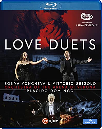 Blu-ray cover for “Love Duets” featuring opera singers and an orchestra.