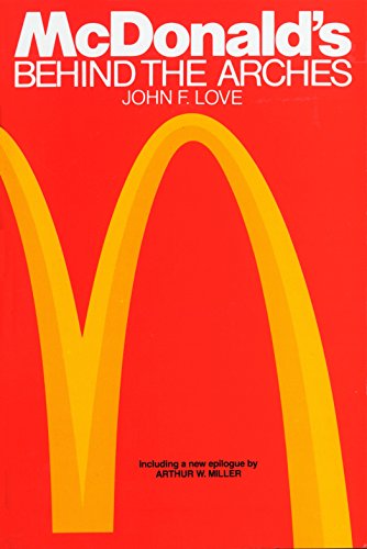 Red book cover with golden McDonald’s arches and title text.