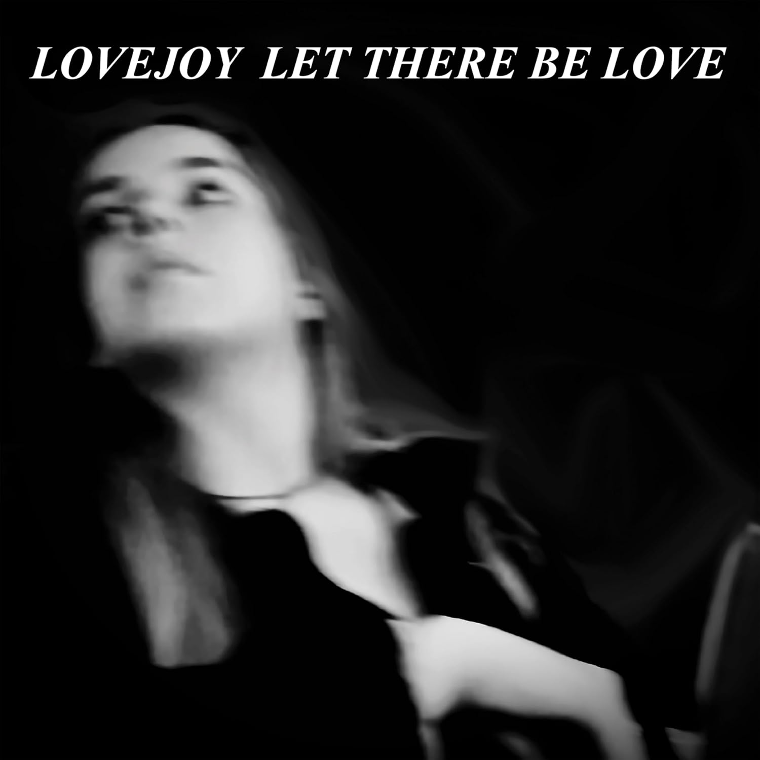 Black and white vinyl album cover featuring a blurred portrait of a woman.
