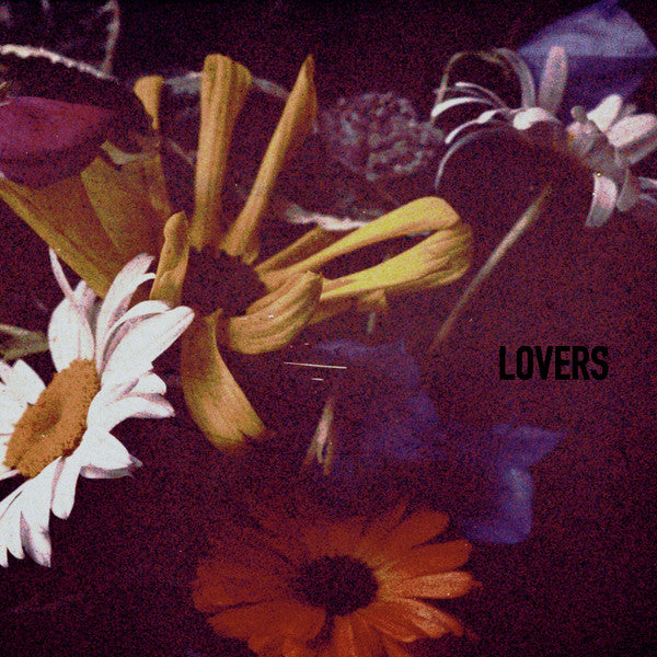 Vinyl record cover with close-up image of colorful, wilting flowers.