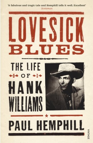 Book cover: "Lovesick Blues," biography of Hank Williams, with portrait.