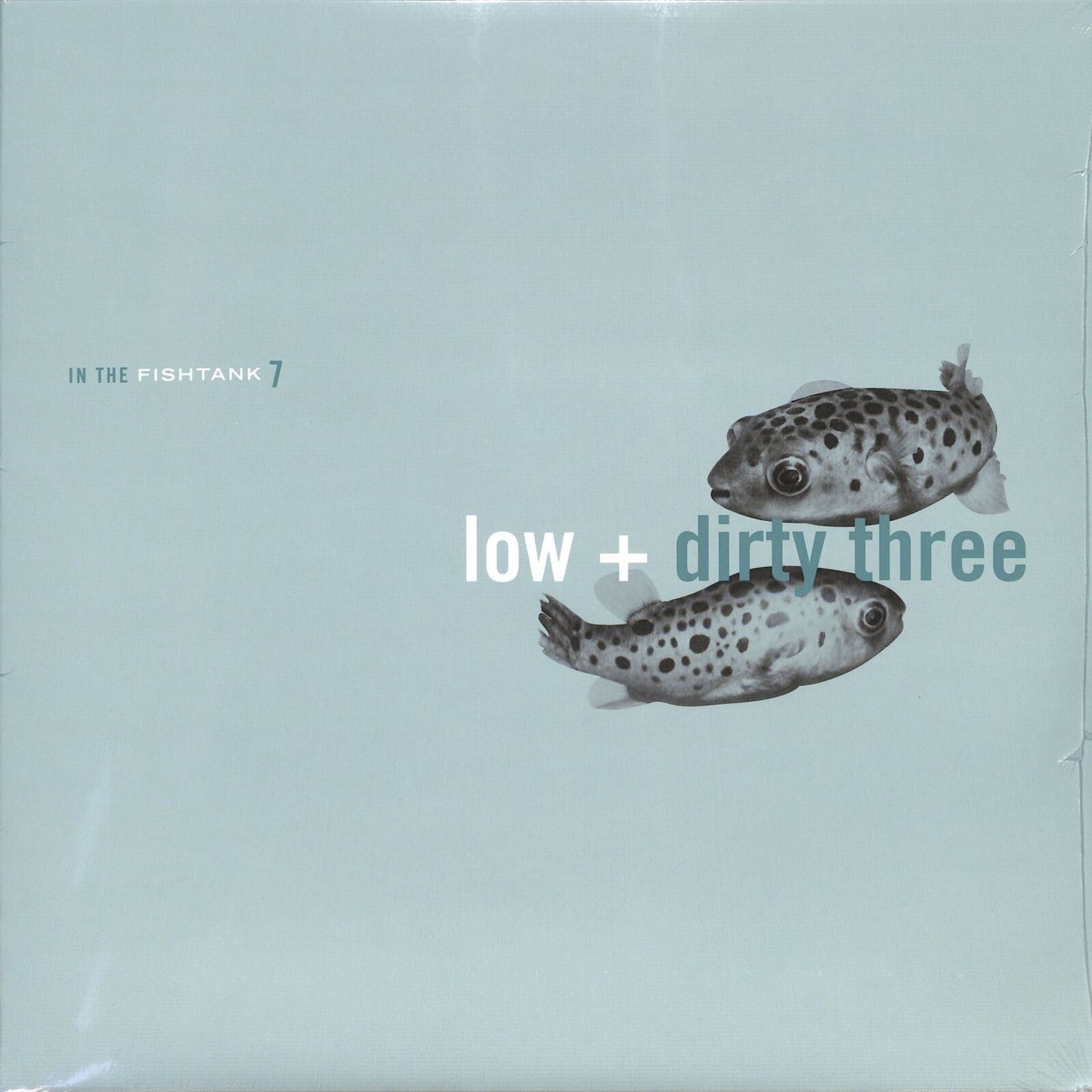 Vinyl record cover: light blue background with pufferfish and text.