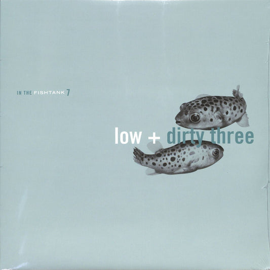 Vinyl record cover: light blue background with pufferfish and text.
