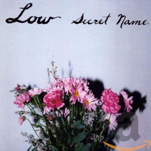CD cover for Low’s “Secret Name” featuring pink and white flowers.