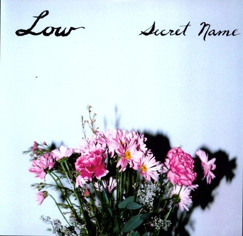 Album cover for Low’s “Secret Name” with pink flowers.