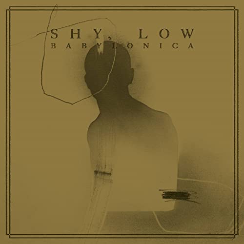 Vinyl album cover: shadowed profile of a person’s head and back.