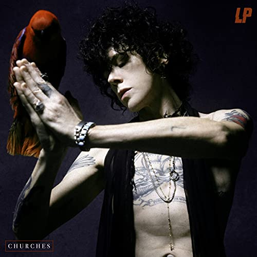 CD cover: Man with parrot, tattoos, dark clothing, and profile view.