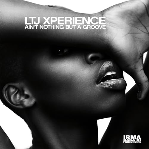Black and white album cover featuring a close-up of a woman’s face.