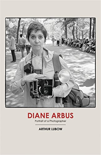 Book cover featuring a black and white portrait of Diane Arbus with a camera.