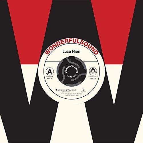 Vinyl record label for Luca Nieri’s “Alchemy” with red and black geometric design.
