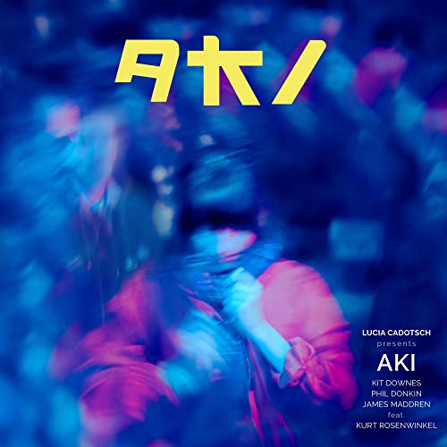 CD cover for Lucia Cadotsch’s “AKI” with blurred figure in blue and pink.