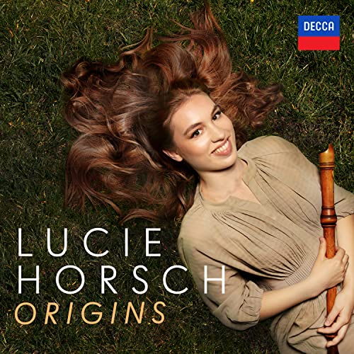 CD cover: Lucie Horsch with long hair and a recorder, lying in grass.