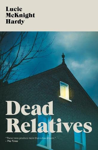 Book cover: dark house with lit windows, title “Dead Relatives”.
