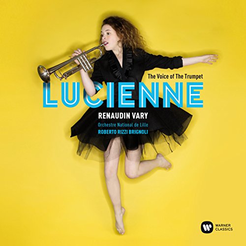 A woman in a black dress playing a trumpet on a yellow background.
