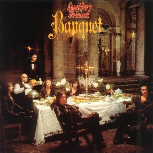 "Album cover: 'Lucifer's Friend - Banquet' showing people dining at a formal table."