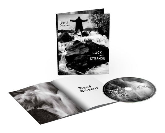 Luck And Strange" Blu-ray packaging featuring a figure on a hillside and waterfall.