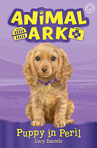 Book cover featuring a golden cocker spaniel puppy with a purple collar.