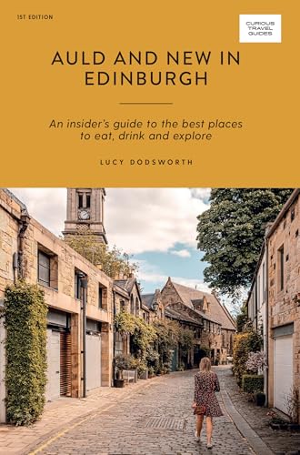 Edinburgh travel guide cover with cobblestone street and building image.