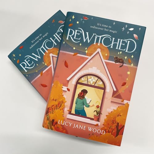 Two copies of the book Rewitched by Lucy Jane Wood featuring an illustrated house.