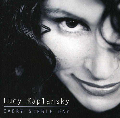 Black and white close-up of a woman's face with text "Lucy Kaplansky, Every Single Day".