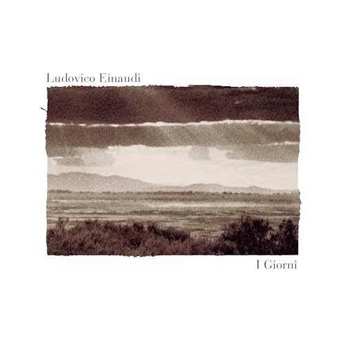 Ludovico Einaudi “I Giorni” CD cover with landscape and torn edges.