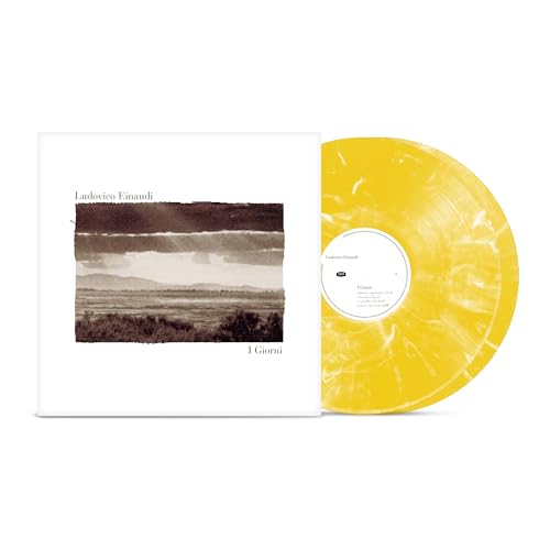 Ludovico Einaudi’s “I Giorni” vinyl record, with yellow and white swirl coloring.
