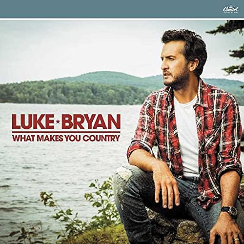 Luke Bryan album cover with artist portrait and rural landscape background.