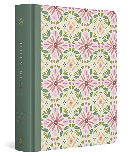 A Bible with a green spine and a floral patterned cover in pink and green.