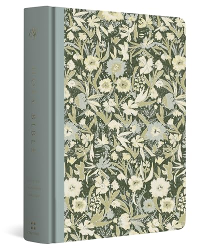 Bible with a blue spine and a cover featuring a green floral pattern.