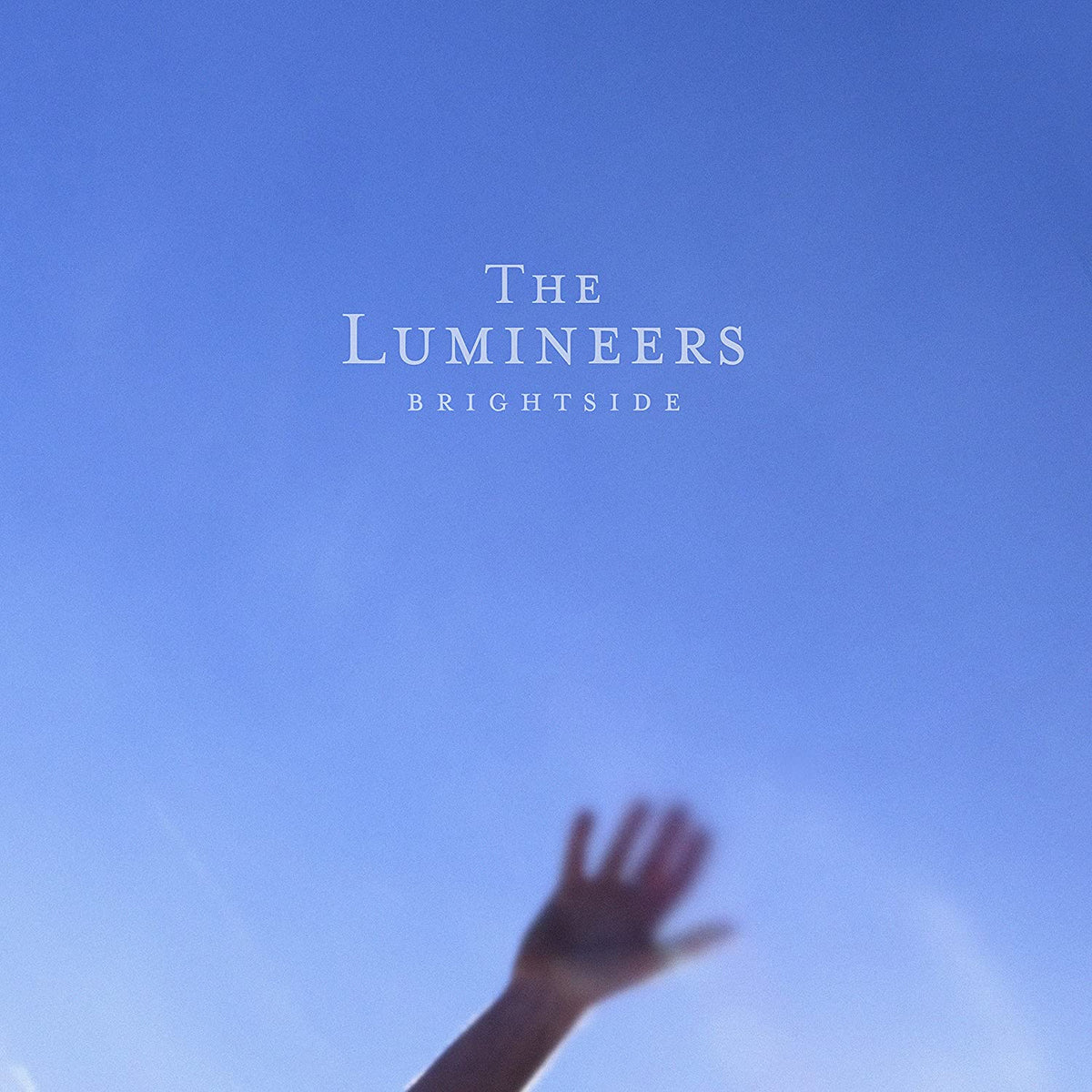 The Lumineers "BRIGHTSIDE" CD case and disc with a blue, atmospheric image.