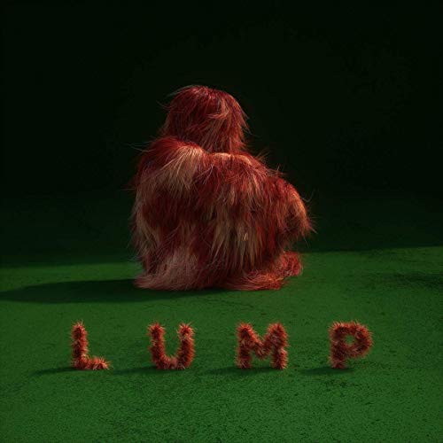Red, furry creature sitting with the word "LUMP" in textured letters.