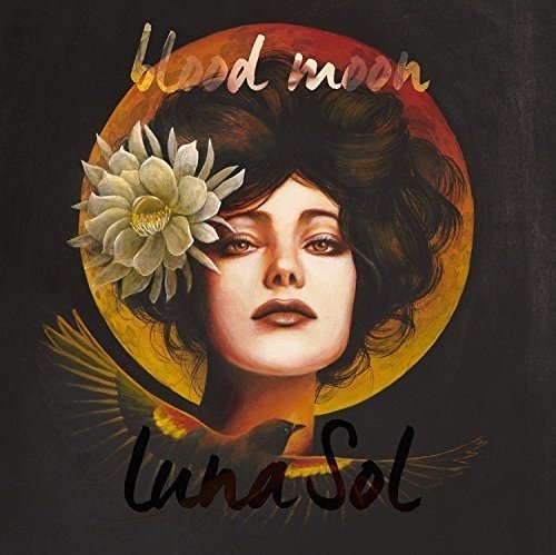 CD cover: woman’s face with flower, red and gold circular design.
