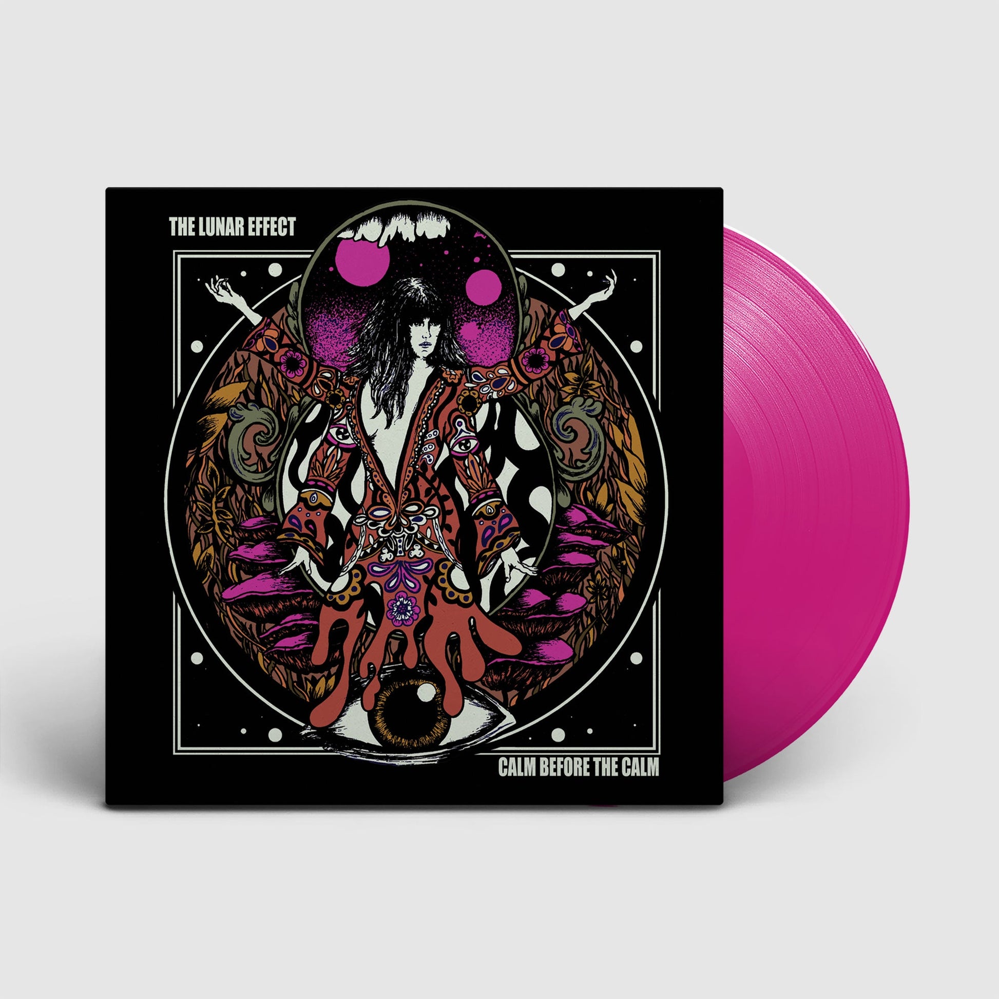Vinyl record cover with surreal art and a pink disc beside it.