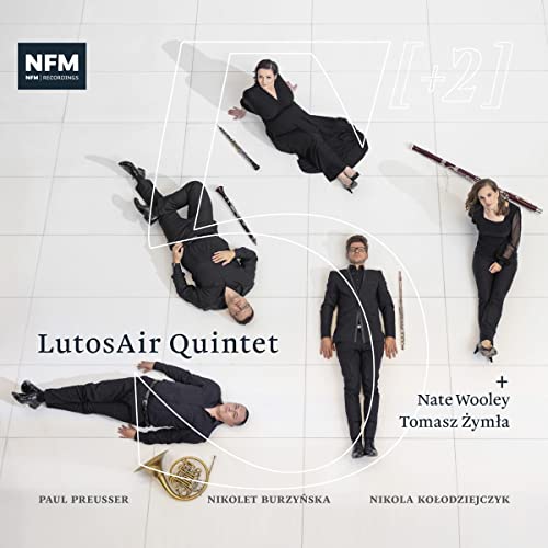 CD cover featuring four musicians in formal wear with wind instruments.