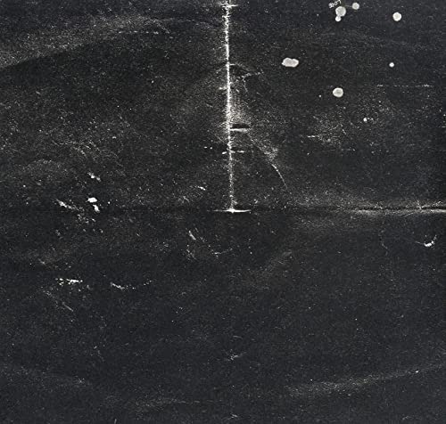 Black and white textured album cover for Lykke Li’s “Wounded Rhymes.”