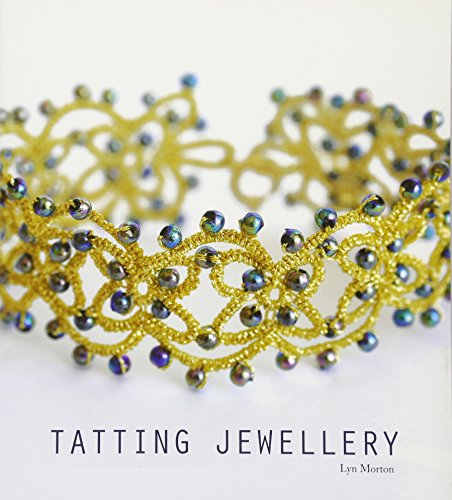 Gold tatted lace bracelet adorned with iridescent beads on a white background.